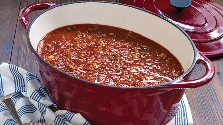 Red oval Carlina Cooker Dutch oven with chili