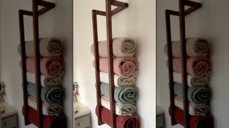 A DIY wooden towel wall shelf.