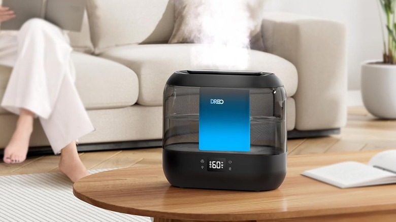 A Dreo Smart Humidifier on a wood coffee table