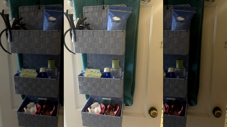 Woven door organizer hanging on door