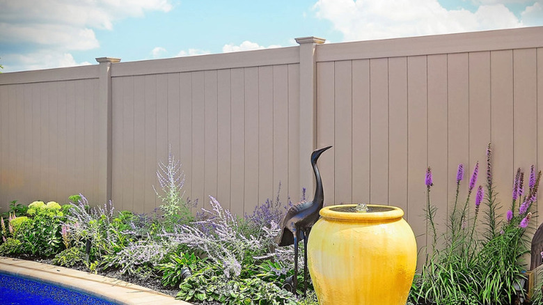Vinyl privacy fence in yard