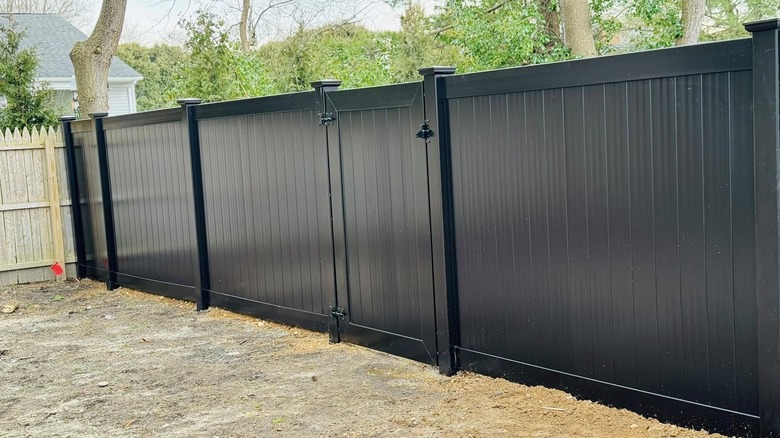 PVC vinyl privacy fence in yard
