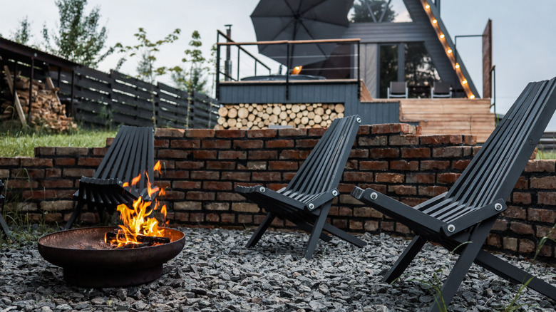 Deep firepit with three chairs