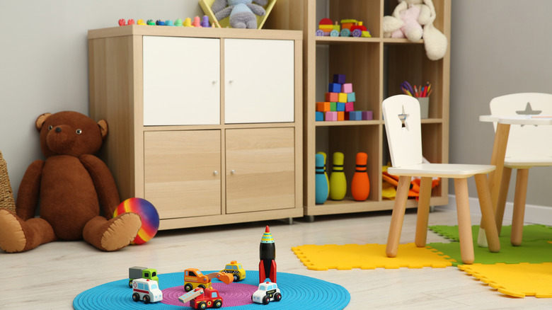 Playroom with light floors and toys