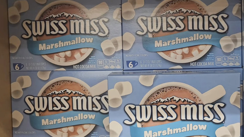 Boxes of Swiss Miss hot cocoa mix on the store shelf