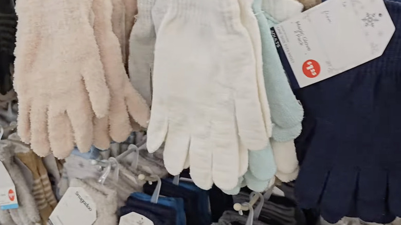 Knit gloves hanging on the store shelf
