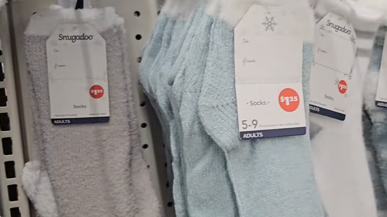 Cozy socks hanging on store shelves