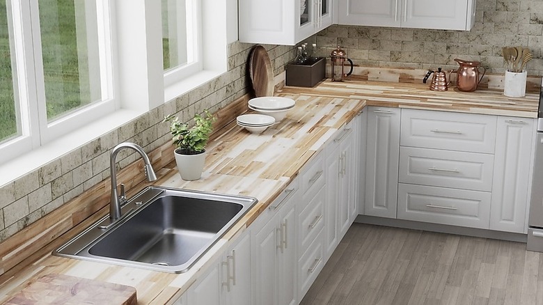 Acacia wood butcher block countertop in a kitchen