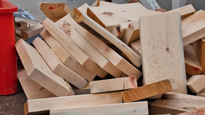 Pile of scrap wood on a work bench