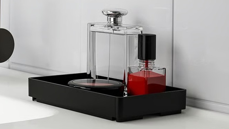 SKOGSVIKEN tray holding bottles and compact