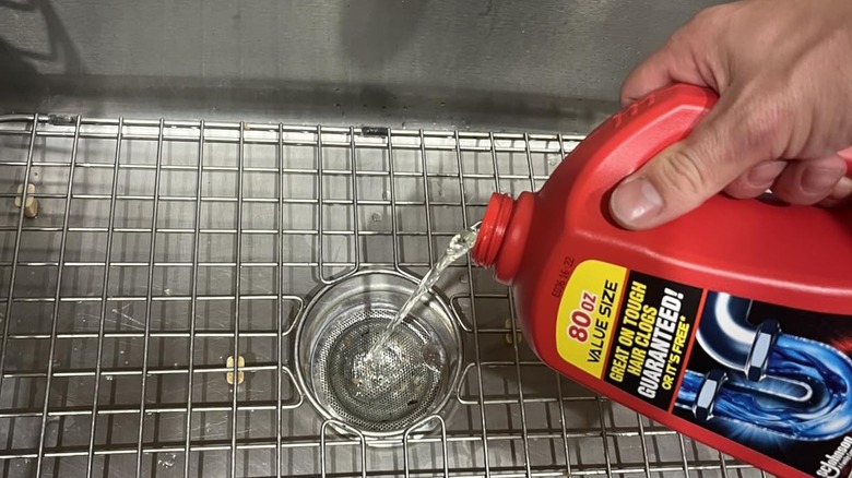 a person pouring Drano Max Gel Drain Clog Remover & Cleaner into a sink