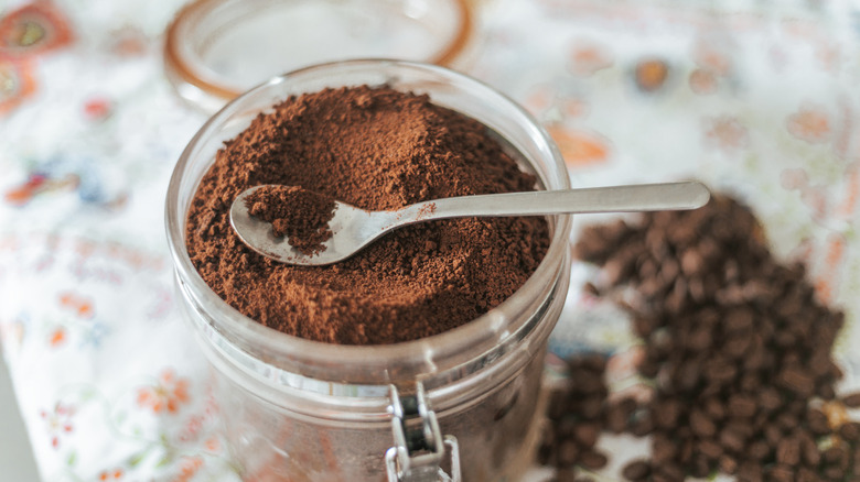 Close-up of a jar filled with coffee grounds