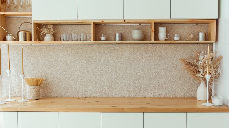 Clean kitchen counter with hidden appliances