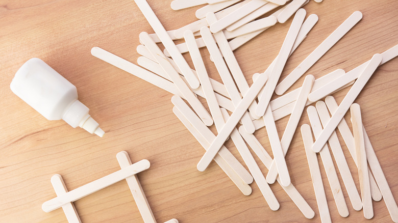 popsicle sticks laying on table
