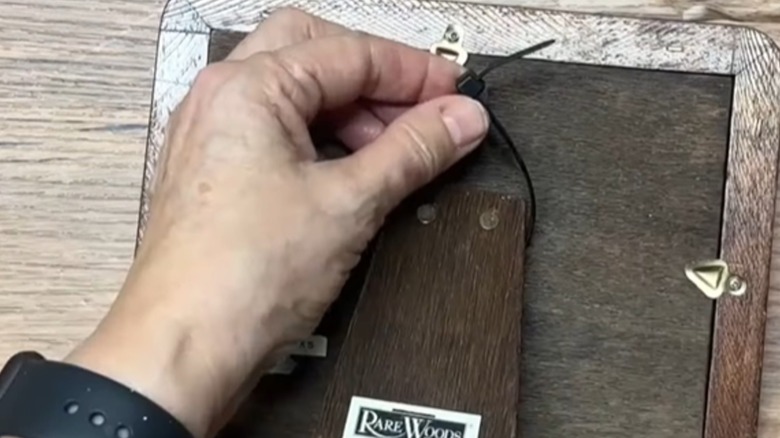 zip tie on picture frame