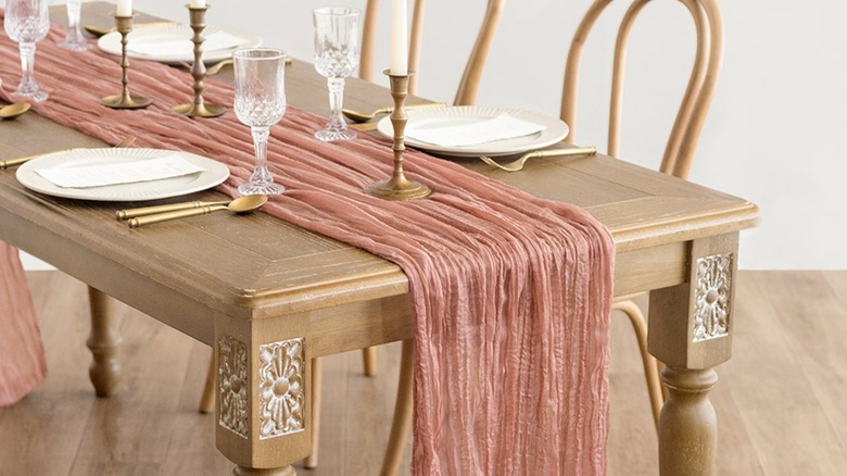 cheesecloth table runner on table