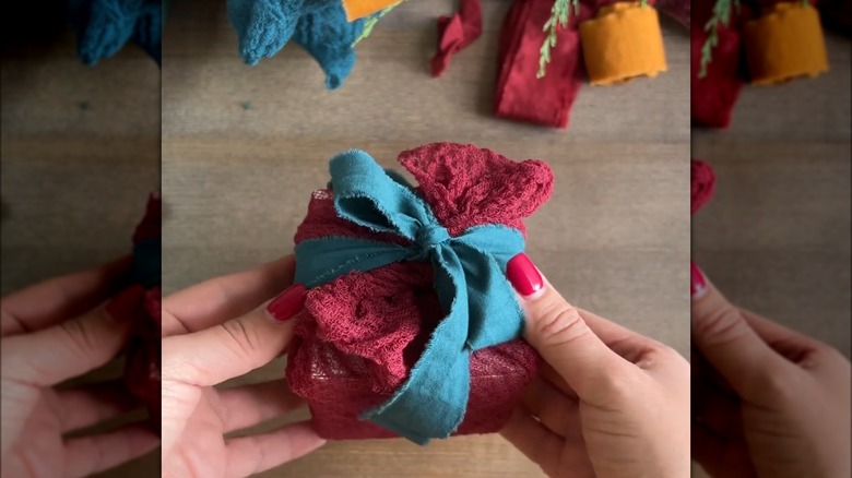 gift wrapped in cheesecloth