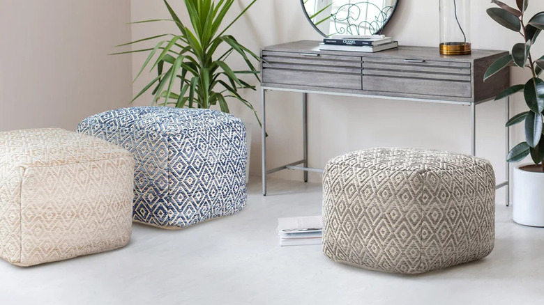 Three patterned poufs in office