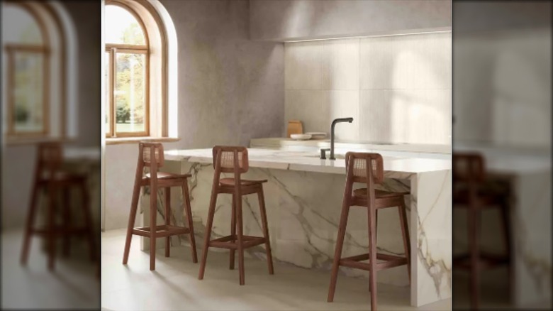 Calacatta marble with brown veins on kitchen island