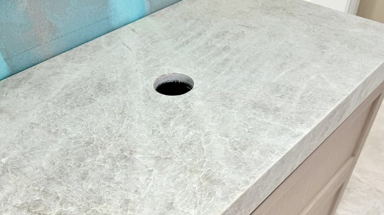 White feather veined marble countertop in kitchen