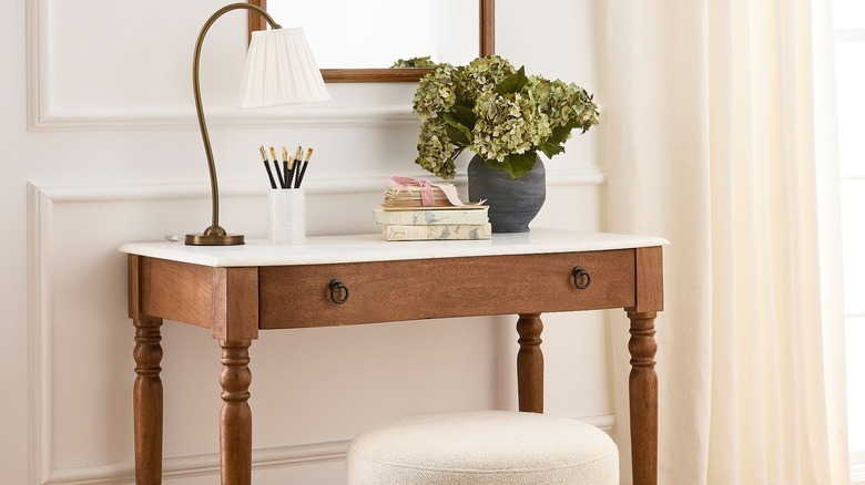 marble top brown writing desk