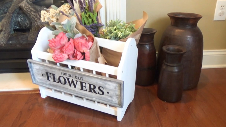 Image of how to use a magazine rack to show off flowers