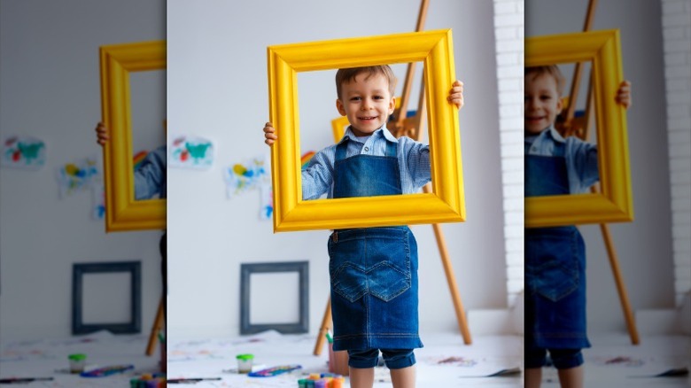 A woman looking at an antique smiling
