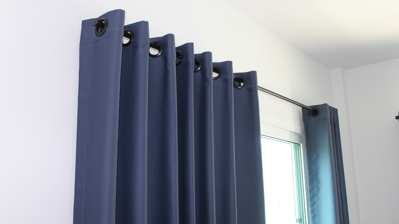 dark blue curtains on window