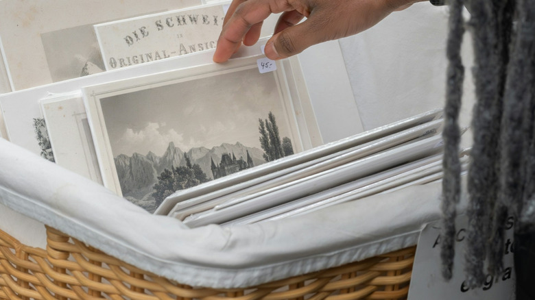 Lined square picnic basket with artwork and mementos
