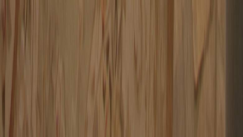 French cottage style entryway with floral sofa