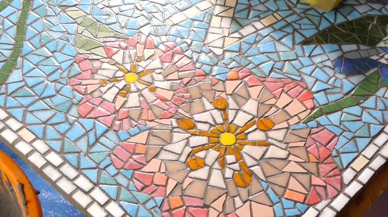 Close up of beautiful mosaic flowers on a large sign
