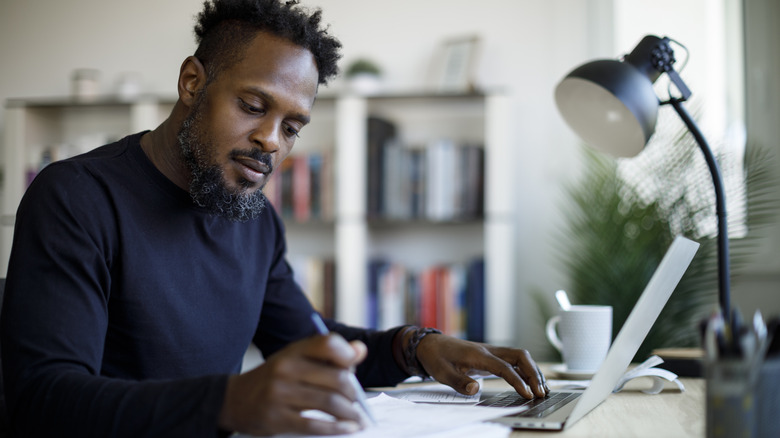 man in home office