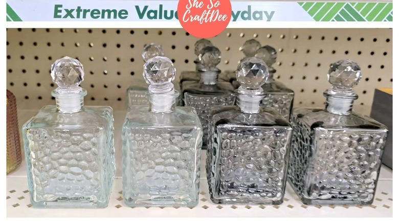 Decorative glass jars on a store shelf