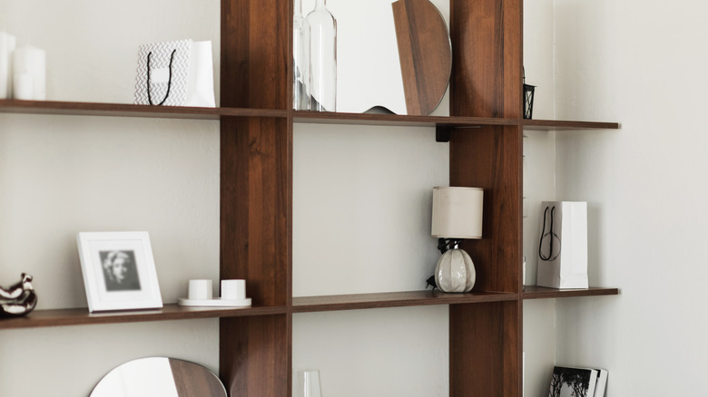 Bookshelf that is lightly decorated