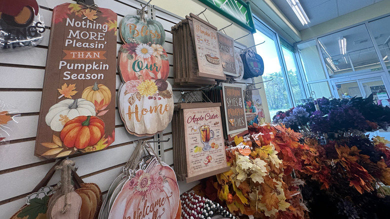The interior of a Dollar Tree showing autumn-styled products