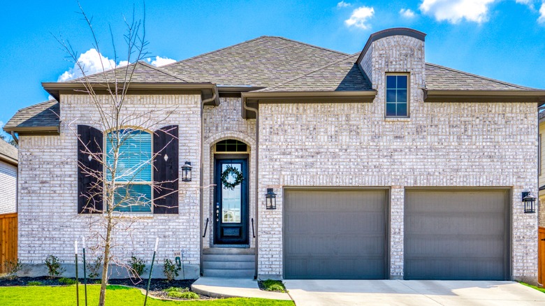 Large home exterior stone wall