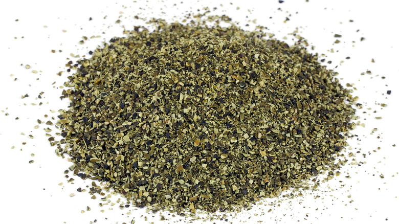 A pile of kelp meal; a type of seaweed fertilizer