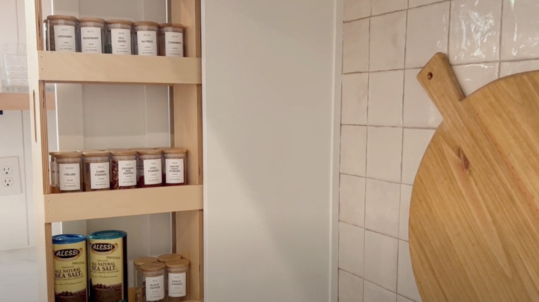 Spice rack pull out next to stove alcove