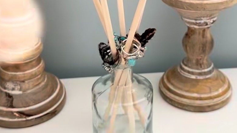 Jewelry storage bottle