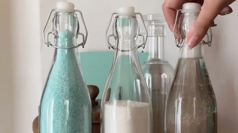 Glass bottles filled with laundry products