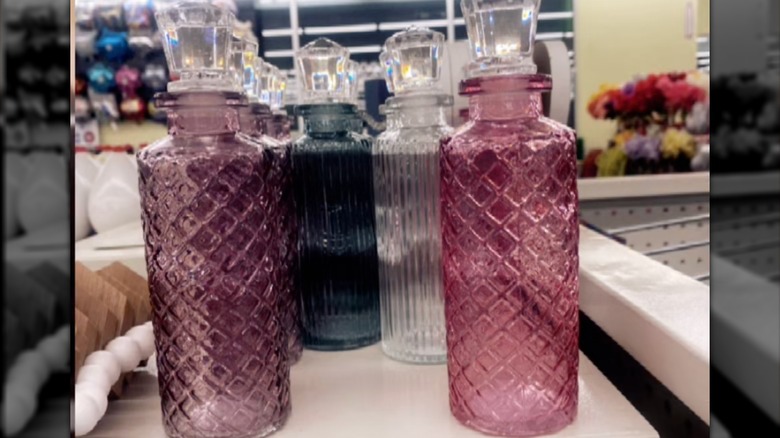Glass bottles on shelf