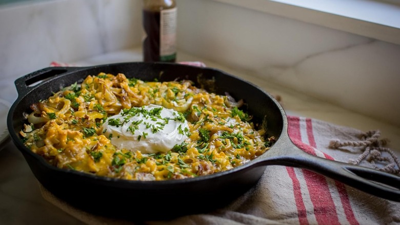 Cast iron pan with a meal inside