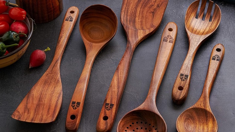 Set of wooden cooking utensils on a countertop