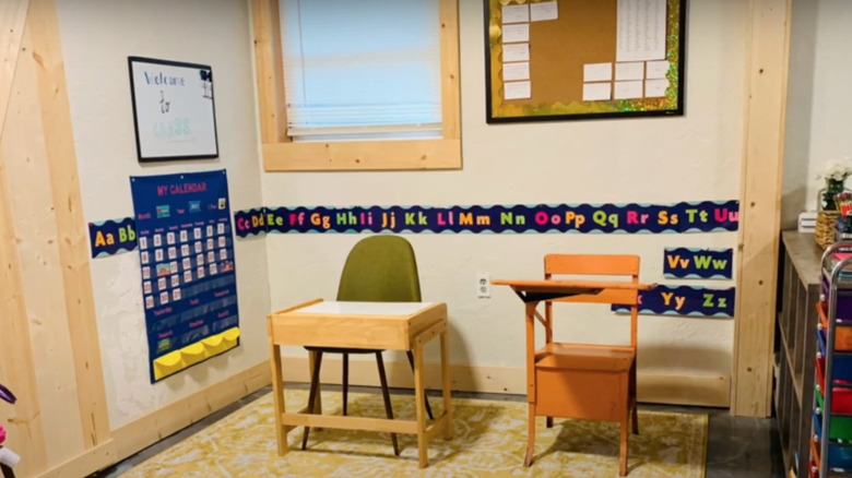 classroom with desks in corner