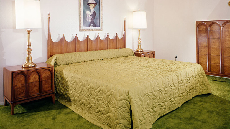 Avocado green carpet and bed