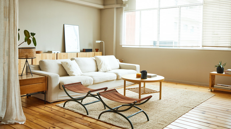 A jute rug in all white living room
