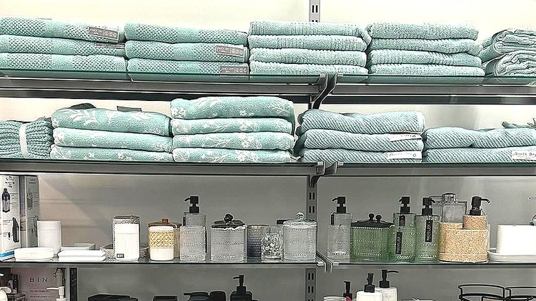 The bath section at T.J. Maxx with towels in various shades of blue