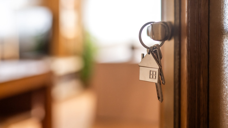Keys hanging in the door of a new home