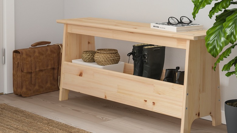 IKEA simple wooden bench with shoe storage for home entryway