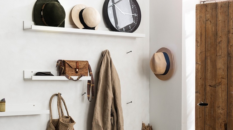 IKEA MOSSLANDA hooks for extra storage hack in an entryway